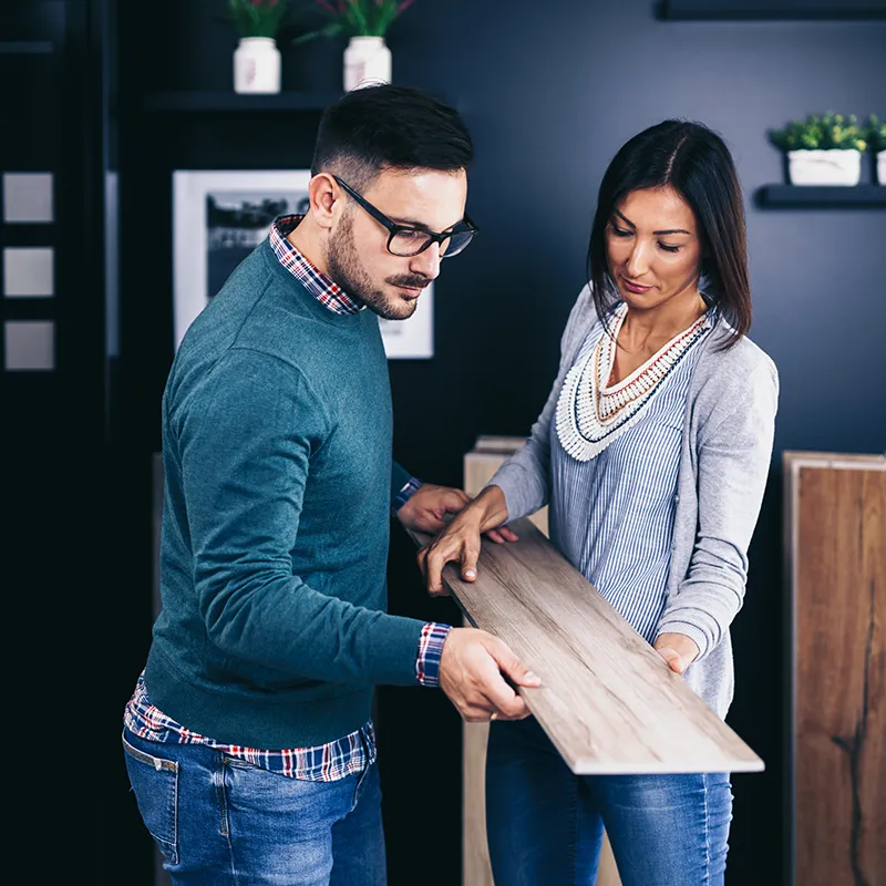 Two-people-looking-at-floor-plank-800x800